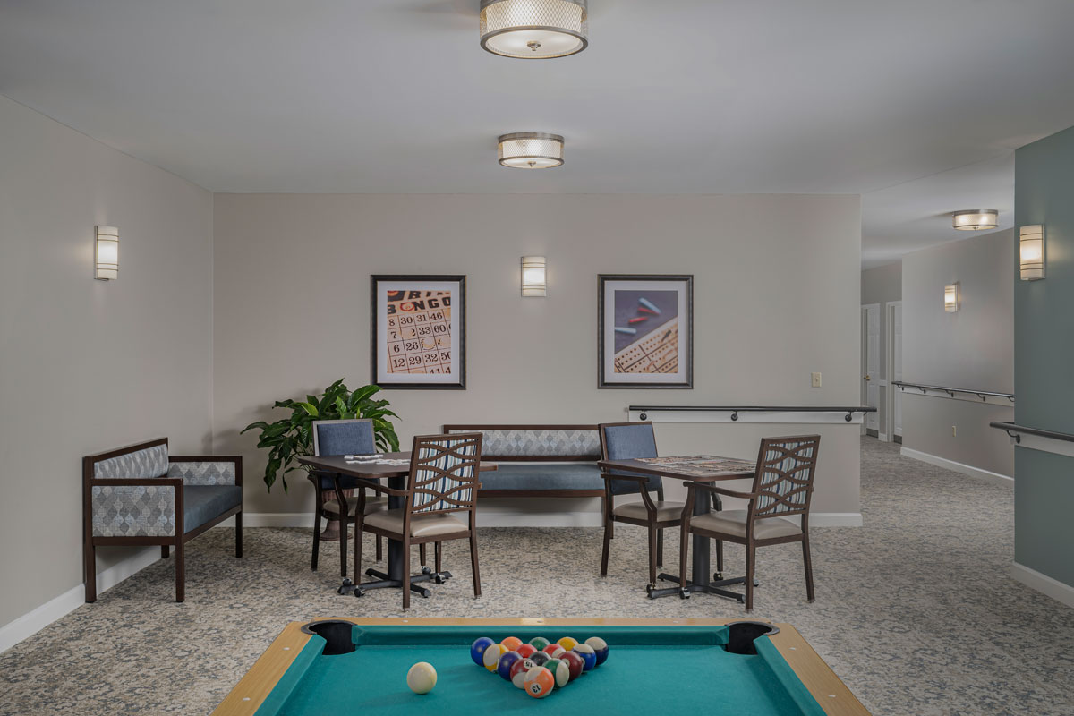 game area with board games and pool table